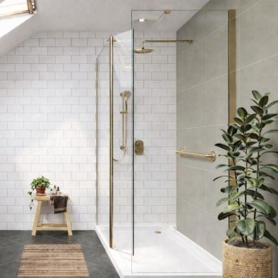 Stylish accessible bathroom with walk-in shower, grab rail and non-slip flooring under skylight